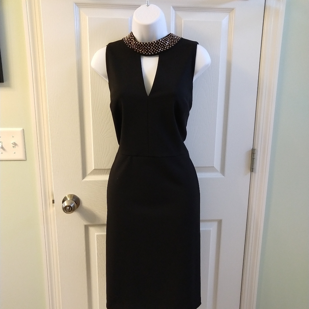 Calvin Klein sleeveless sheath dress with keyhole.